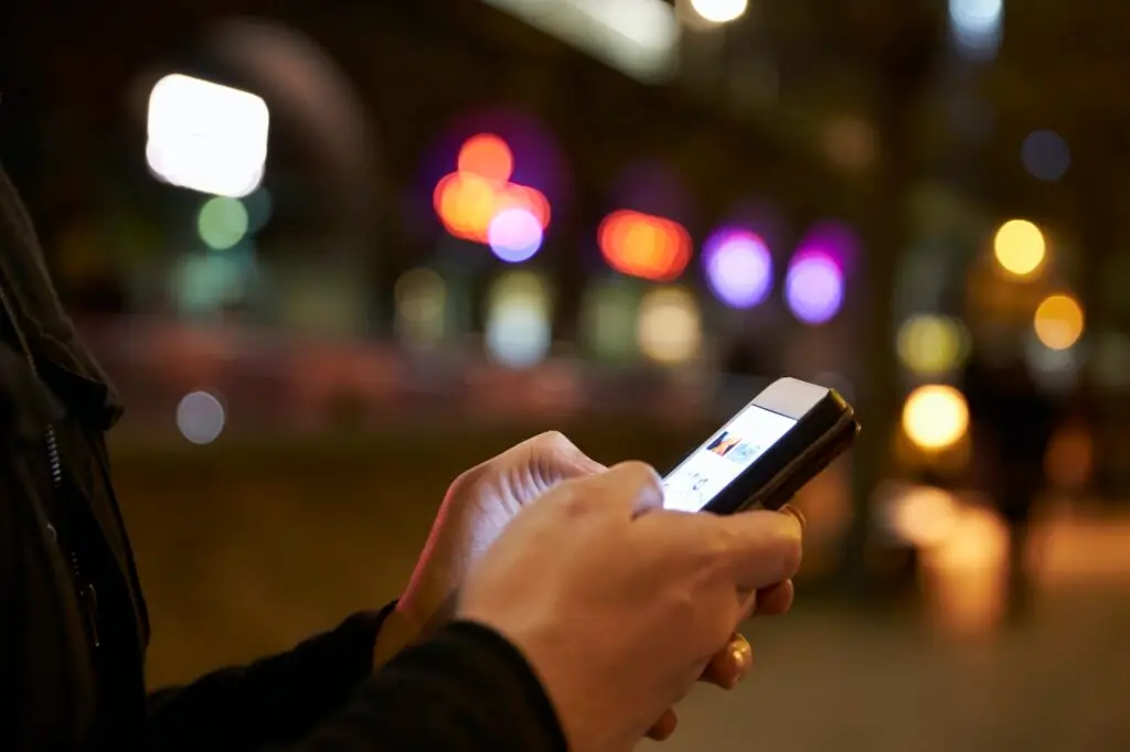 Person Using Mobile Phone