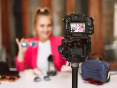 close-up-black-camera-recording-new-video-of-fashion-blogger-iso
