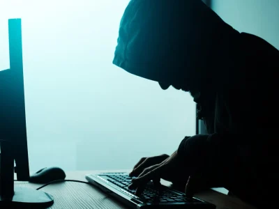 hooded-computer-hacker-hacking-network