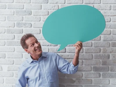 Man with speech bubbles